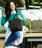 REVIENNENT BAG